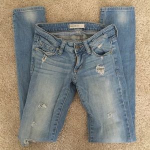 Light blue distressed jeans