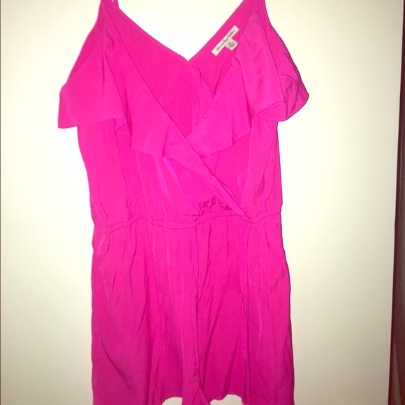 Hot pink romper.