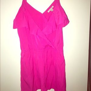 Hot pink romper.