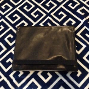 15 inch MacBook Pro leather carrying case.