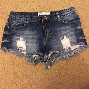 High waisted distressed shorts