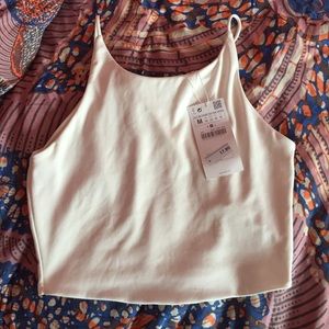 Cropped white spaghetti strap tank