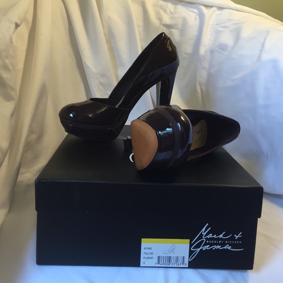 Plum patent leather pumps