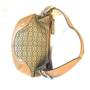 Coach small signature purse in brown