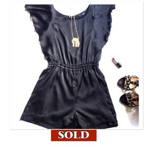 Black Romper with Ruffle Sleeves