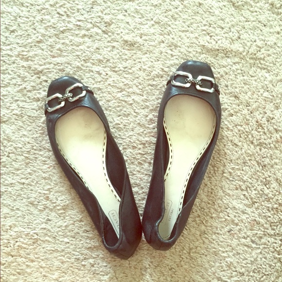 Black and silver Coach Flats