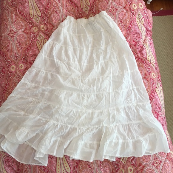Floor-length white skirt