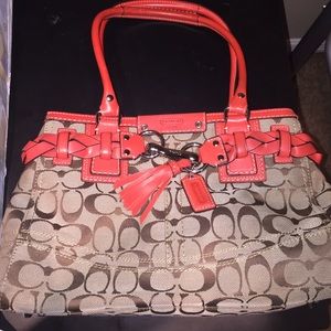 Coach purse with orange accent