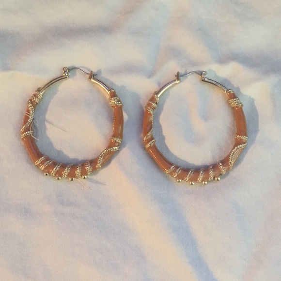 Gold and brown hoops. Never been worn!