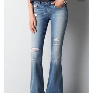 Distressed artist flare jeans