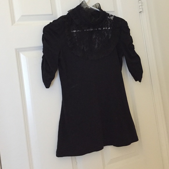 Black cotton lace turtle neck.