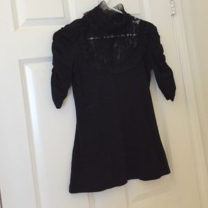 Black cotton lace turtle neck.