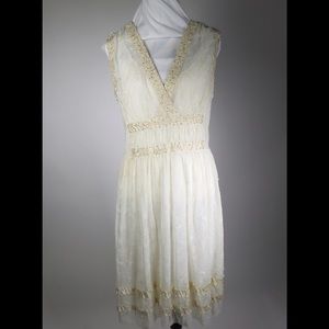 Cream beaded cocktail dress.