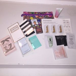 13 piece make up/fragrance sample set plus bag