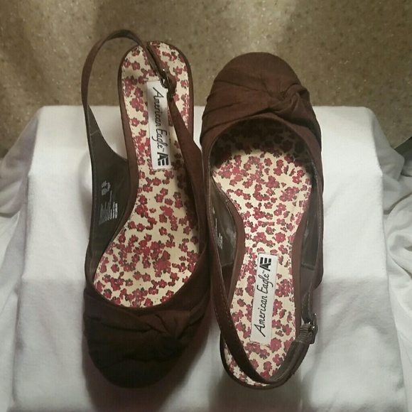 Brown wedge sling backs.