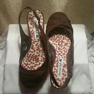 Brown wedge sling backs.