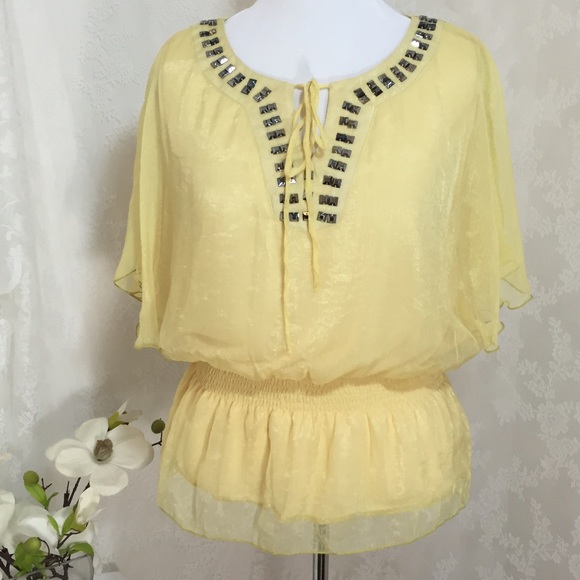 Yellow blouse with rhinestones  B004