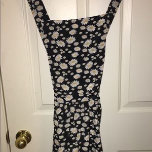 Overall type dress with cross back.