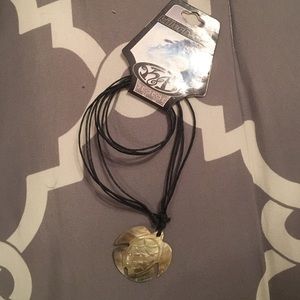 Carved sea turtle shell necklace