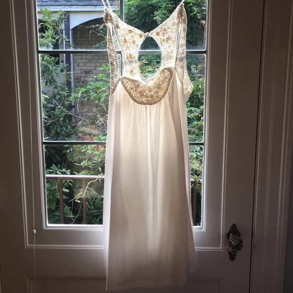 Angelic white dress with detailing and pockets