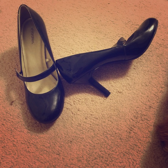 Shiny black patent leather heels