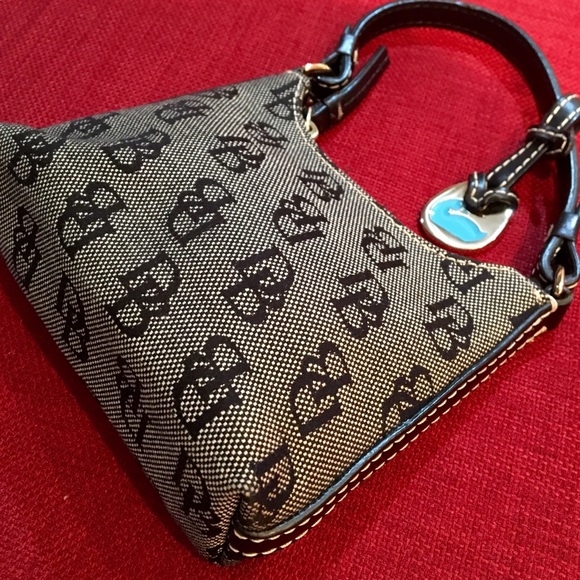 Dooney & Bourke Handbags - Authentic Mini Dooney & Bourke canvas Monogram Bag