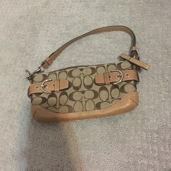 Authentic coach purse. Never been used.