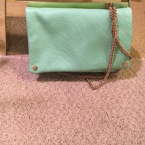 Cross body purse with gold chain