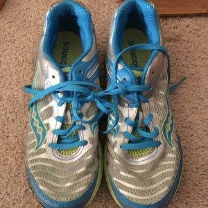 Saucony line and blue tennis shoes