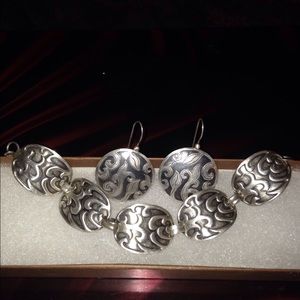 Silpada sterling silver bracelet and earring set.