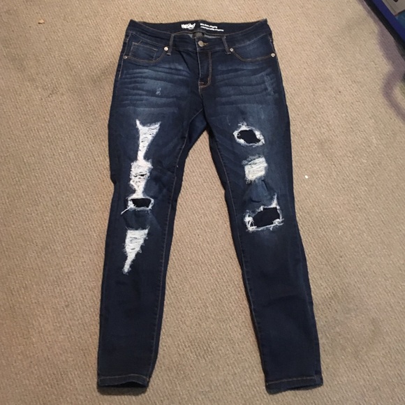 Destroyed dark wash skinny jean jeggings