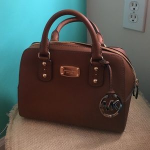 Brown Michael Kors handbag.
