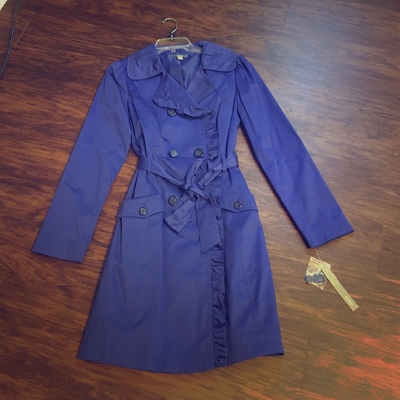 Blue trenchcoat with ruffle detailing