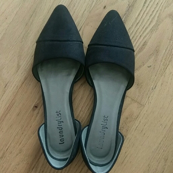 Black d'Orsay shoes.