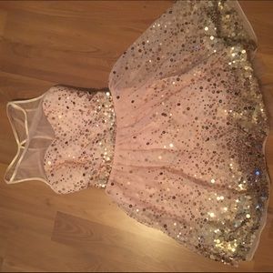 Pale pink dress with golden sparkles