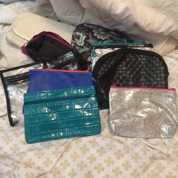 Lot of travel makeup and small jewelry bags