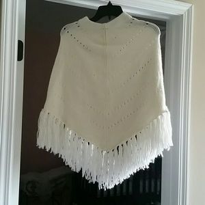 Poncho sweater with fringe