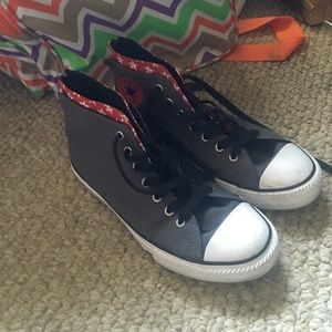 New grey and red high top converse.