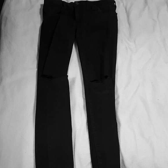 Solid black ripped at the knee jeggings