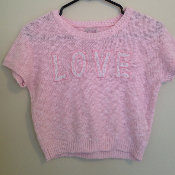 A sweater pink short sleeve shirt