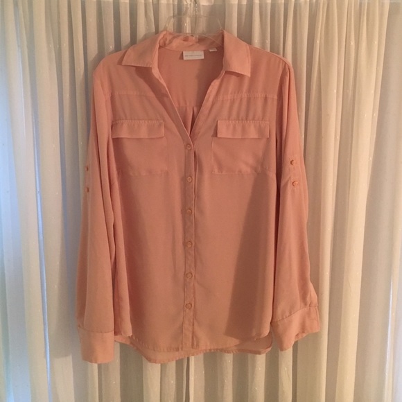 Peach button down top.