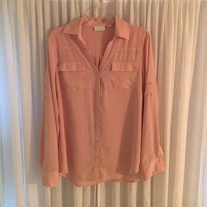 Peach button down top.
