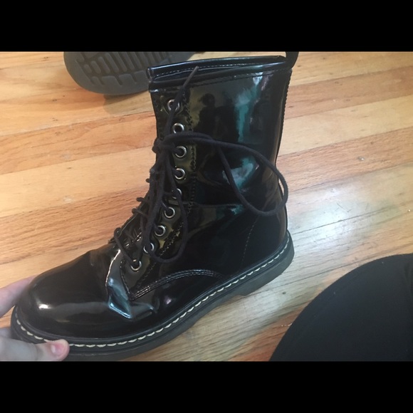 Shiny black combat boots