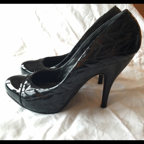 BCBGirls black high heel pumps
