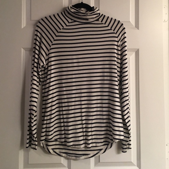 Black and white striped turtleneck.