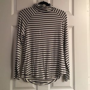 Black and white striped turtleneck.