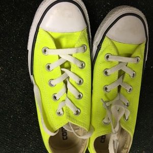 Neon yellow converse tennis shoes
