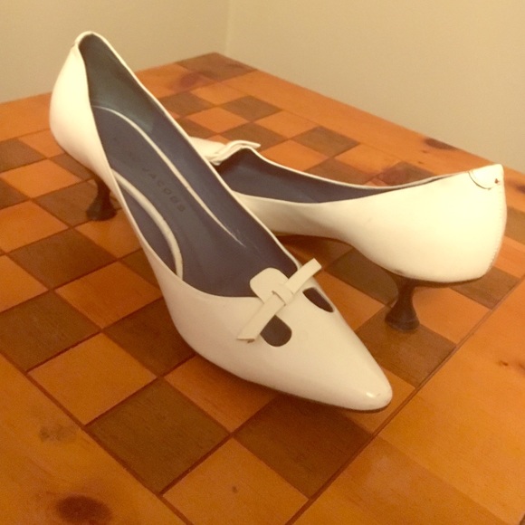 White kitten heels
