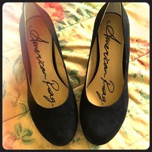 Velvety black platform heels