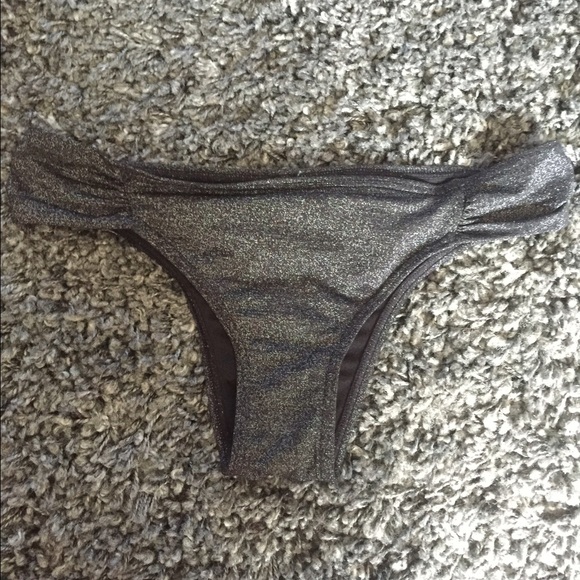 Black, sparkly Rip Curl swim suit bottoms